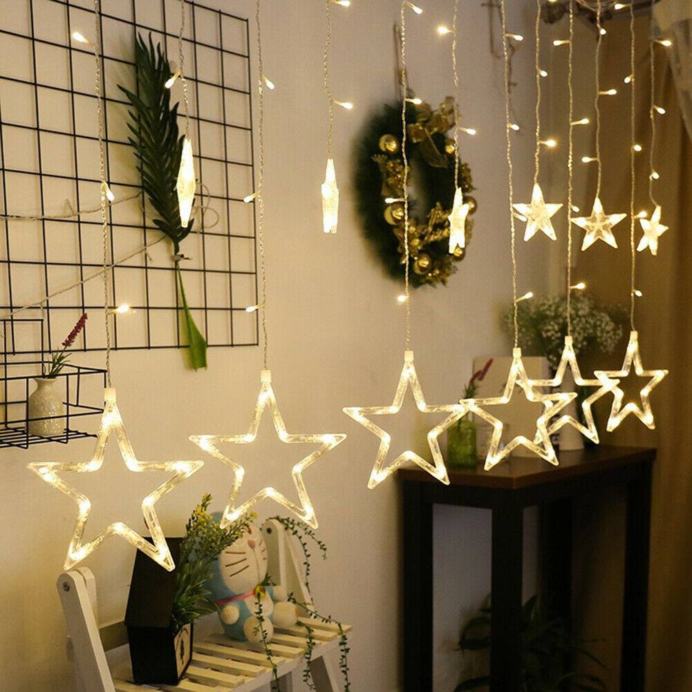 catena per decorazioni natalizie con 12 stelle bianco caldo